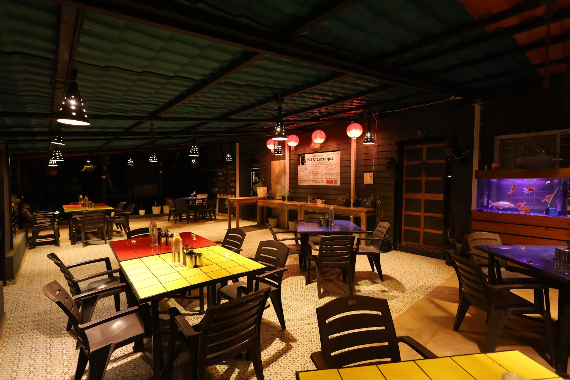 The open-air dining hall with lanterns